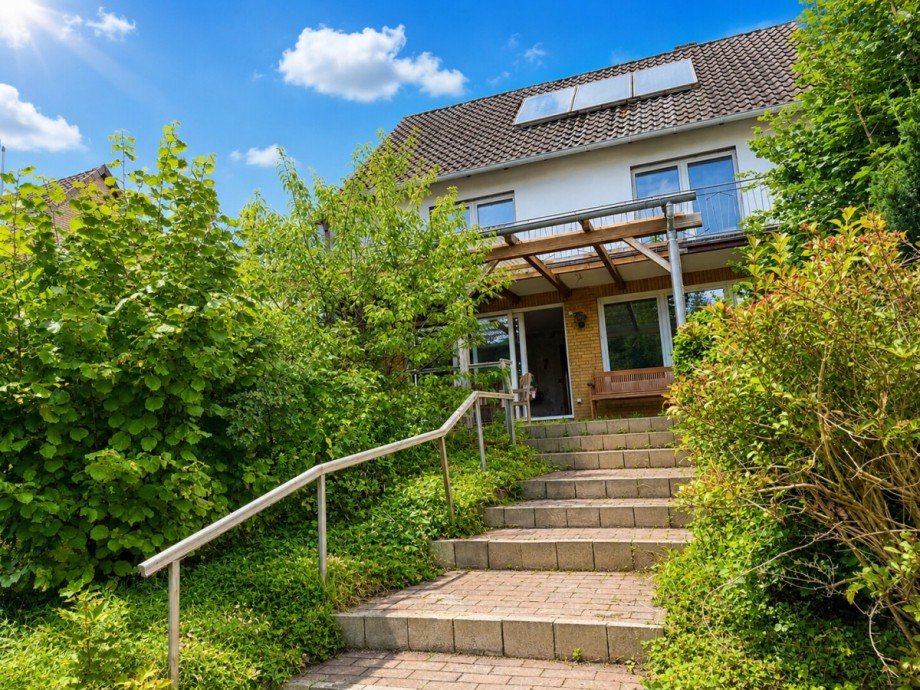 R�ckw�rtige Hausansicht Einfamilienhaus Nienhagen