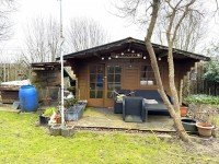 Bild (ec3b65600c932e7d4b367e0bbf2d6265): Alles auf einer Ebene! Kleiner Bungalow mit Carport in ruhiger und idyllischer Wohnlage